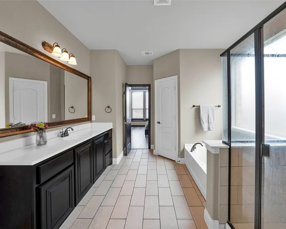 bathroom cabinets, walls, doors and trim painted by Bear Creek Painting, Inc.